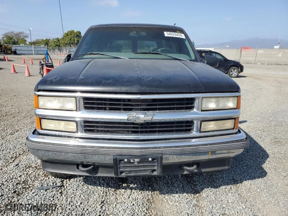 1999 Chevrolet Tahoe Z71 with VIN 1GNEK13R5XJ308924, listed as a Copart auction lot 64463984 with 229,181 mi miles and Salvage Title. Bid and sale history available at carsss.com. Image 5.