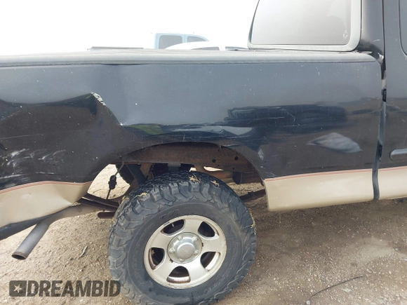 2000 Ford F-150 XL with VIN 1FTRX17L4YKB03771, listed as a IAAI auction lot 41668491 with 1 mi miles. Bid and sale history available at carsss.com. Image 6.