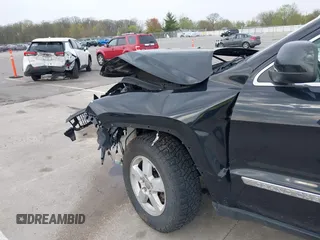 2011 Jeep Grand Cherokee Laredo z VIN 1J4RR4GG8BC504878, wystawiony jako IAAI lot #42097973 z przebiegiem 190 583 mil mil oraz . Historia ofert i sprzedaży dostępna na DreamBid. Obrazek 15.