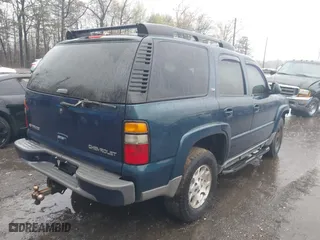 2005 Chevrolet Tahoe LT with VIN 1GNEK13T75R253693, listed as a IAAI auction lot 42013420 with 152,952 mi miles. Bid and sale history available at carsss.com. Image 4.