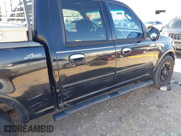 2003 Ford F-150 XLT with VIN 1FTRW07L43KB05221, listed as a IAAI auction lot 41762332 with 226,660 mi miles. Bid and sale history available at carsss.com. Image 6.