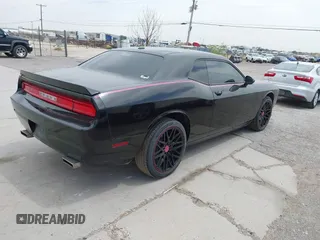 2012 Dodge Challenger SXT Plus with VIN 2C3CDYAG5CH268607, listed as a IAAI auction lot 41982122 with 188,091 mi miles. Bid and sale history available at carsss.com. Image 4.