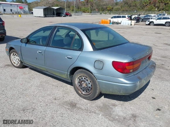 2002 Saturn SL with VIN 1G8ZJ52752Z117416, listed as a IAAI auction lot 41486679 with 318,311 mi miles. Bid and sale history available at carsss.com. Image 3.