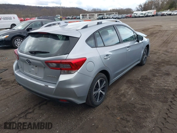 2023 Subaru Impreza Premium with VIN 4S3GTAV6XP3703123, listed as a IAAI auction lot 42018724 with 80,610 mi miles and . Bid and sale history available at DreamBid. Image 4.