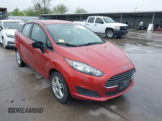 2019 Ford Fiesta SE z VIN 3FADP4BJ9KM112070, wystawiony jako IAAI lot #41966891 z przebiegiem 136 734 mil mil oraz . Historia ofert i sprzedaży dostępna na DreamBid. Obrazek 1.