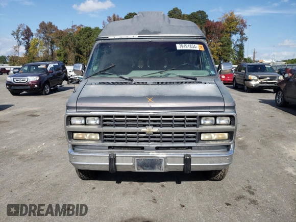 1994 Chevrolet Chevy Van с VIN 1GBEG25K5RF123489, выставлен на аукционе Copart как лот 79491854 с пробегом 82 970 миль миль и Списание • Salvage title. История ставок и продаж доступна на DreamBid. Изображение 5.
