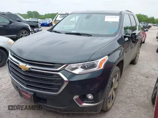 2020 Chevrolet Traverse LT with VIN 1GNERHKW4LJ174137, listed as a IAAI auction lot 42108220 with 69,761 mi miles and . Bid and sale history available at DreamBid. Image 2.