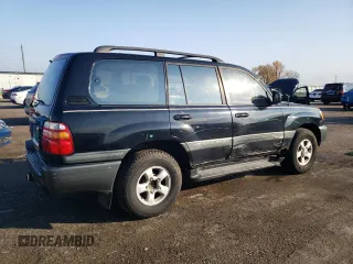 1999 Toyota Land Cruiser with VIN JT3HT05J5X0072564, listed as a Copart auction lot 77000044 with 312,428 mi miles and Salvage Title. Bid and sale history available at carsss.com. Image 3.