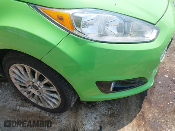 2014 Ford Fiesta Titanium z VIN 3FADP4FJ7EM203322, wystawiony jako IAAI lot #42448840 z przebiegiem 91 901 mil mil oraz . Historia ofert i sprzedaży dostępna na DreamBid. Obrazek 6.