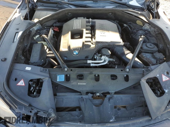 2011 BMW 7 Series 740i with VIN WBAKA4C51BC612629, listed as a Copart auction lot 77372234 with 164,471 mi miles and Salvage Title. Bid and sale history available at carsss.com. Image 11.