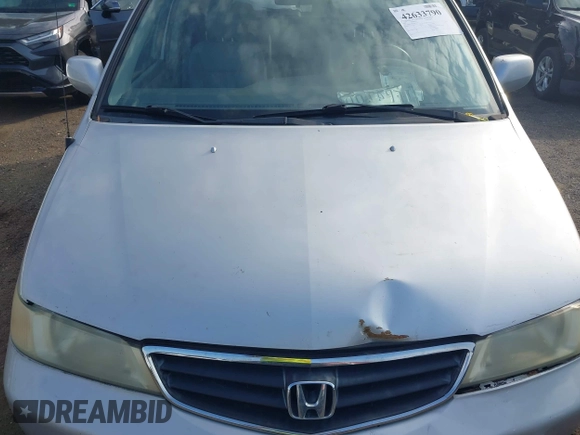 2003 Honda Odyssey EX-L with VIN 5FNRL18913B061340, listed as a IAAI auction lot 42633790 with 1,281,195 mi miles and . Bid and sale history available at DreamBid. Image 10.