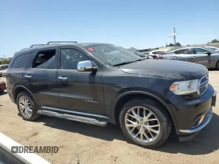 2014 Dodge Durango Citadel with VIN 1C4RDJEG5EC394396, listed as a Copart auction lot 61416305 with 185,730 mi miles and Salvage title. Bid and sale history available at DreamBid. Image 4.