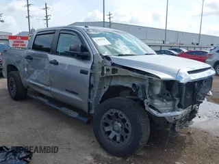 2014 Toyota Tundra SR5 z VIN 5TFEY5F10EX150247, wystawiony jako IAAI lot #42456728 z przebiegiem 139 143 mil mil oraz . Historia ofert i sprzedaży dostępna na DreamBid. Obrazek 1.