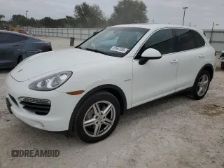 2012 Porsche Cayenne S Hybrid z VIN WP1AE2A20CLA92536, wystawiony jako Copart lot #87667355 z przebiegiem 117 267 mil mil oraz Tytuł czysty. Historia ofert i sprzedaży dostępna na DreamBid. Obrazek 1.