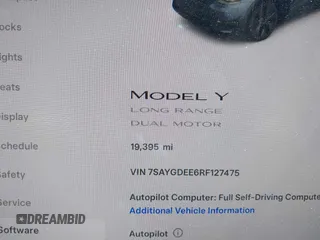 2024 Tesla Model Y Long Range with VIN 7SAYGDEE6RF127475, listed as a IAAI auction lot 41919580 with 19,395 mi miles. Bid and sale history available at carsss.com. Image 7.