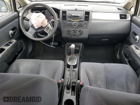 2009 Nissan Versa S with VIN 3N1BC11E79L433933, listed as a Copart auction lot 54953675 with 196,785 mi miles and Salvage Title. Bid and sale history available at DreamBid. Image 8.