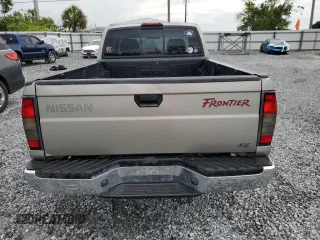 2000 Nissan Frontier XE z VIN 1N6DD26S6YC415423, wystawiony jako Copart lot #59086535 z przebiegiem 122 746 mil mil oraz Szkoda całkowita • Salvage title. Historia ofert i sprzedaży dostępna na DreamBid. Obrazek 6.