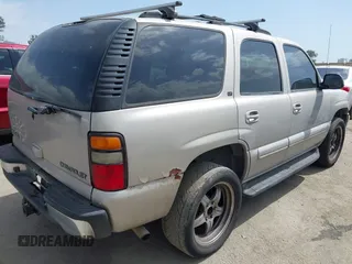 2004 Chevrolet Tahoe LS with VIN 1GNEC13T84J103666, listed as a IAAI auction lot 41921063 with 209,404 mi miles. Bid and sale history available at carsss.com. Image 4.