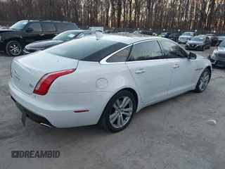 2017 Jaguar XJ with VIN SAJWJ2GD5H8W08395, listed as a IAAI auction lot 41014883 with 80,584 mi miles. Bid and sale history available at carsss.com. Image 4.