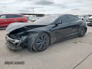 2023 Tesla Model S с VIN 5YJSA1E59PF512318, выставлен на аукционе Copart как лот 58377895 с пробегом 34 402 миль миль и Списание • Salvage title. История ставок и продаж доступна на DreamBid. Изображение 1.