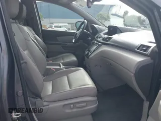 2016 Honda Odyssey EX-L with VIN 5FNRL5H68GB104350, listed as a IAAI auction lot 42023306 with 124,672 mi miles. Bid and sale history available at carsss.com. Image 5.