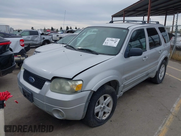 2005 Ford Escape Hybrid with VIN 1FMCU95H05KC95225, listed as a IAAI auction lot 41798610 with 216,659 mi miles and . Bid and sale history available at DreamBid. Image 17.