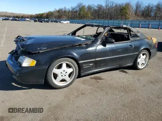 2000 Mercedes-Benz SL-Class with VIN WDBFA68F8YF195078, listed as a Copart auction lot 48329565 with 0 mi miles and Salvage Title. Bid and sale history available at carsss.com. Image 1.