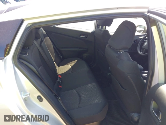2021 Toyota Prius LE z VIN JTDL9MFU3M3028805, wystawiony jako IAAI lot #42043610 z przebiegiem 26 436 mil mil oraz . Historia ofert i sprzedaży dostępna na DreamBid. Obrazek 8.