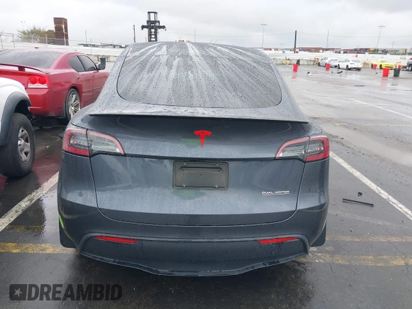 2023 Tesla Model Y Performance with VIN 7SAYGDEF0PF774282, listed as a IAAI auction lot 41807031 with Not Provided miles and . Bid and sale history available at DreamBid. Image 15.