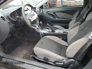 2004 Toyota Celica GT with VIN JTDDR32T540174376, listed as a Copart auction lot 54751115 with 85,335 mi miles and Salvage Title. Bid and sale history available at DreamBid. Image 7.
