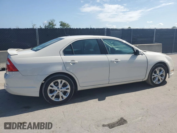 2012 Ford Fusion SE z VIN 3FAHP0HA7CR133859, wystawiony jako Copart lot #61153125 z przebiegiem 100 822 mil mil oraz Czysty tytuł • Clean title. Historia ofert i sprzedaży dostępna na DreamBid. Obrazek 3.