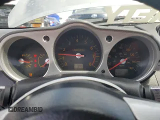 2003 Nissan 350Z Touring z VIN JN1AZ34E23T003943, wystawiony jako Copart lot #55221405 z przebiegiem 198 292 mil mil oraz Szkoda całkowita • Salvage title. Historia ofert i sprzedaży dostępna na DreamBid. Obrazek 9.