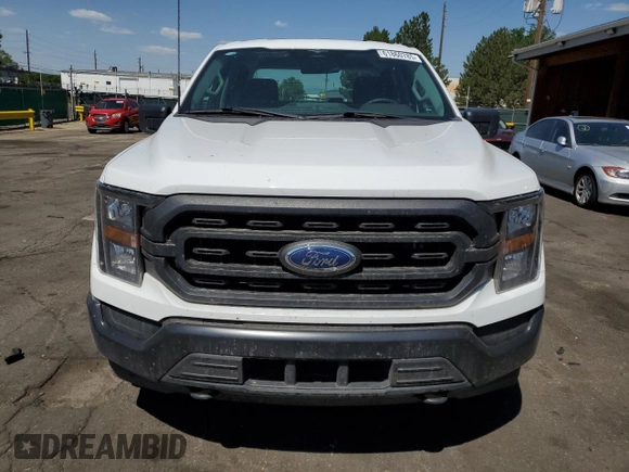 2023 Ford F-150 XL with VIN 1FTFW1E89PKD98613, listed as a Copart auction lot 61860785 with 25,568 mi miles and Salvage title. Bid and sale history available at DreamBid. Image 5.
