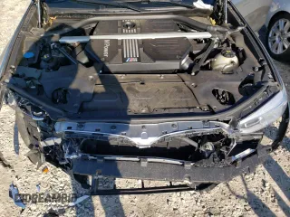 2020 BMW X4 M z VIN 5YMUJ0C00LLA99541, wystawiony jako Copart lot #69965383 z przebiegiem Nie podano mil oraz . Historia ofert i sprzedaży dostępna na DreamBid. Obrazek 11.