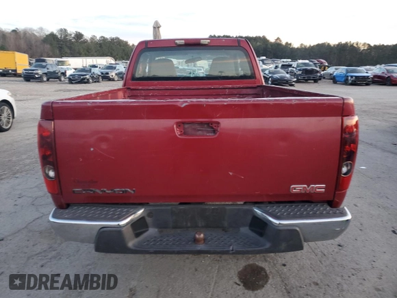 2006 GMC Canyon z VIN 1GTDS198968242449, wystawiony jako Copart lot #41538915 z przebiegiem 172 505 mil mil oraz Szkoda całkowita • Salvage title. Historia ofert i sprzedaży dostępna na DreamBid. Obrazek 6.