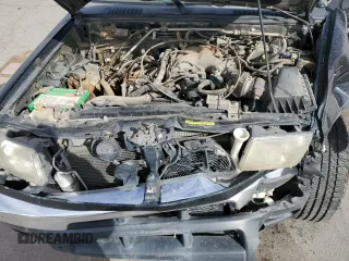 2000 Nissan Frontier XE z VIN 1N6ED26T5YC313494, wystawiony jako Copart lot #46549935 z przebiegiem 271 425 mil mil oraz Szkoda całkowita • Salvage title. Historia ofert i sprzedaży dostępna na DreamBid. Obrazek 13.