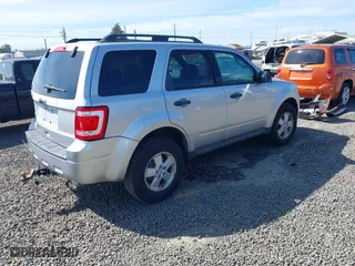 2010 Ford Escape XLT with VIN 1FMCU9D70AKD46774, listed as a IAAI auction lot 41857882 with 93,409 mi miles. Bid and sale history available at carsss.com. Image 4.