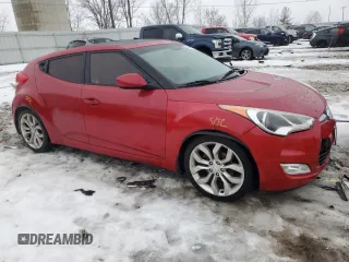 2012 Hyundai Veloster w/Red Int z VIN KMHTC6AD4CU077956, wystawiony jako Copart lot #43504505 z przebiegiem 103 183 mil mil oraz Szkoda całkowita • Salvage title. Historia ofert i sprzedaży dostępna na DreamBid. Obrazek 4.
