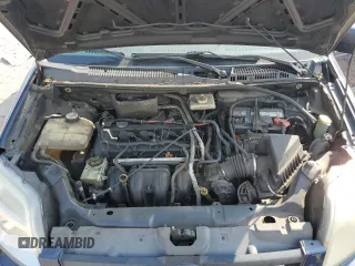 2010 Ford Transit Connect XLT z VIN NM0KS9BN0AT013571, wystawiony jako Copart lot #61586365 z przebiegiem 141 821 mil mil oraz Szkoda całkowita • Salvage title. Historia ofert i sprzedaży dostępna na DreamBid. Obrazek 11.