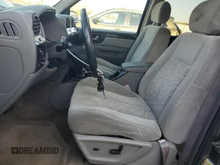 2006 GMC Envoy SLE with VIN 1GKET16S166171992, listed as a Copart auction lot 76676894 with 203,713 mi miles and Salvage Title. Bid and sale history available at DreamBid. Image 7.