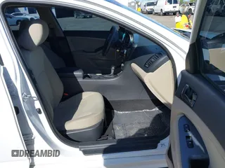 2014 Kia Optima LX with VIN 5XXGM4A70EG307809, listed as a IAAI auction lot 42023169 with 127,617 mi miles. Bid and sale history available at carsss.com. Image 5.