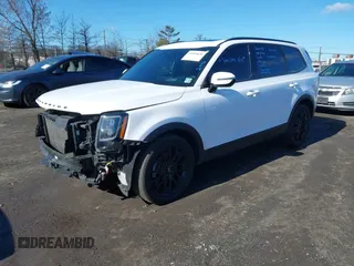 2022 Kia Telluride SX z VIN 5XYP5DHC2NG299501, wystawiony jako IAAI lot #41816830 z przebiegiem 61 413 mil mil oraz . Historia ofert i sprzedaży dostępna na DreamBid. Obrazek 2.