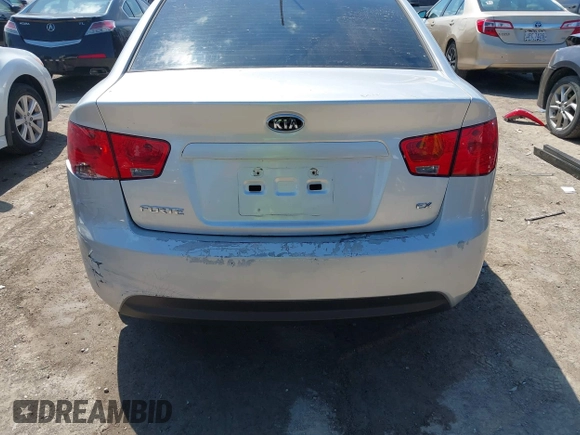 2010 Kia Forte EX z VIN KNAFU4A2XA5838916, wystawiony jako IAAI lot #42380123 z przebiegiem 153 033 mil mil oraz . Historia ofert i sprzedaży dostępna na DreamBid. Obrazek 6.