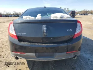 2014 Lincoln MKS z VIN 1LNHL9DK3EG606655, wystawiony jako Copart lot #42008655 z przebiegiem 100 886 mil mil oraz Szkoda całkowita • Salvage title. Historia ofert i sprzedaży dostępna na DreamBid. Obrazek 6.