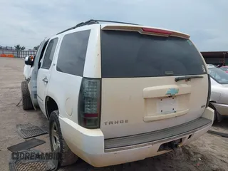 2012 Chevrolet Tahoe LTZ with VIN 1GNSCCE00CR197950, listed as a IAAI auction lot 42393693 with 296,161 mi miles and . Bid and sale history available at DreamBid. Image 3.