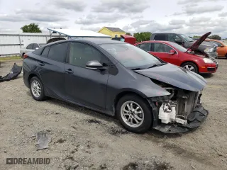 2019 Toyota Prius L Eco with VIN JTDKARFU2K3081959, listed as a Copart auction lot 51679145 with 99,355 mi miles and Salvage Title. Bid and sale history available at carsss.com. Image 4.