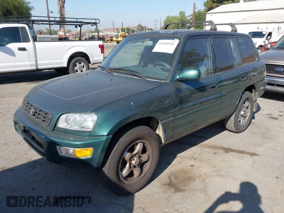 2000 Toyota RAV4 with VIN JT3GP10V4Y7067848, listed as a IAAI auction lot 42689181 with 174,750 mi miles and . Bid and sale history available at DreamBid. Image 2.