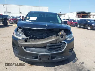2019 Chevrolet Traverse LS with VIN 1GNERFKW1KJ310856, listed as a IAAI auction lot 41806247 with 88,501 mi miles. Bid and sale history available at carsss.com. Image 12.