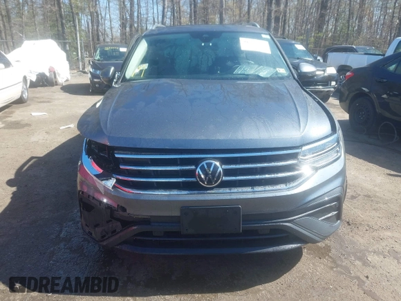 2022 Volkswagen Tiguan SE with VIN 3VV3B7AX1NM120097, listed as a IAAI auction lot 41967493 with 57,802 mi miles and . Bid and sale history available at DreamBid. Image 12.