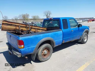 2000 Ford Ranger XLT with VIN 1FTZR15X0YPA34693, listed as a IAAI auction lot 42032043 with 148,099 mi miles. Bid and sale history available at carsss.com. Image 4.